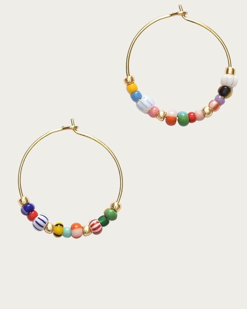 Front of a size O/S Golden Alaia Hoop in Gold in Gold by ANNI LU. | dia_product_style_image_id:330579